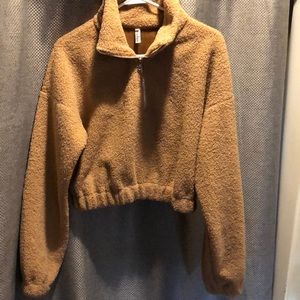 Cropped fuzzy pullover.